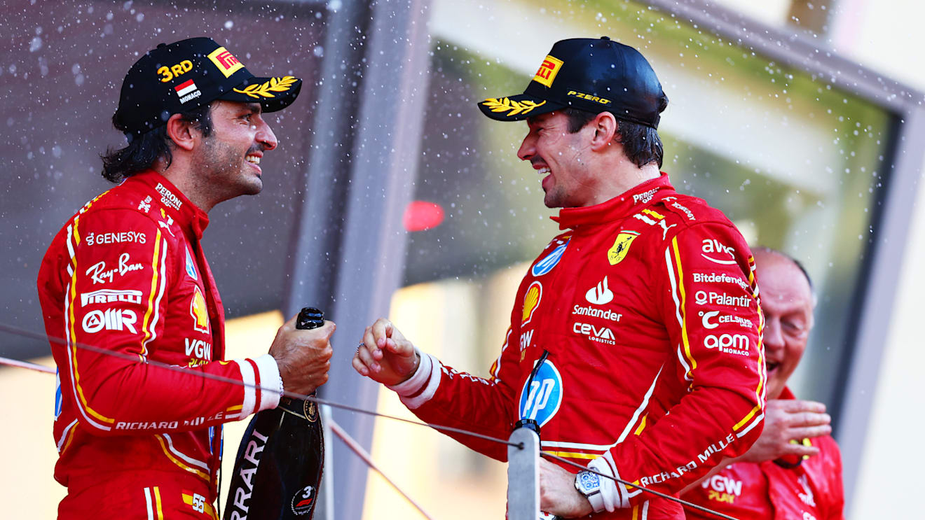 MONTE-CARLO, MONACO - MAY 26: Race winner Charles Leclerc of Monaco and Ferrari and Third placed Carlos Sainz of Spain and Ferrari celebrate on the podium during the F1 Grand Prix of Monaco at Circuit de Monaco on May 26, 2024 in Monte-Carlo, Monaco. (Photo by Bryn Lennon - Formula 1/Formula 1 via Getty Images)