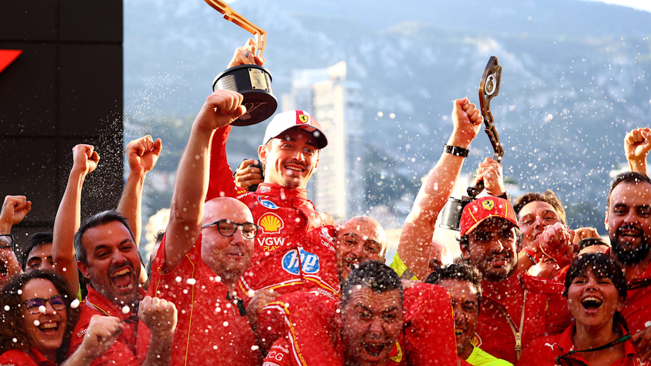 MONTE-CARLO, MONACO - MAY 26: Race winner Charles Leclerc of Monaco and Ferrari celebrates with his team after the F1 Grand Prix of Monaco at Circuit de Monaco on May 26, 2024 in Monte-Carlo, Monaco. (Photo by Clive Rose/Getty Images)