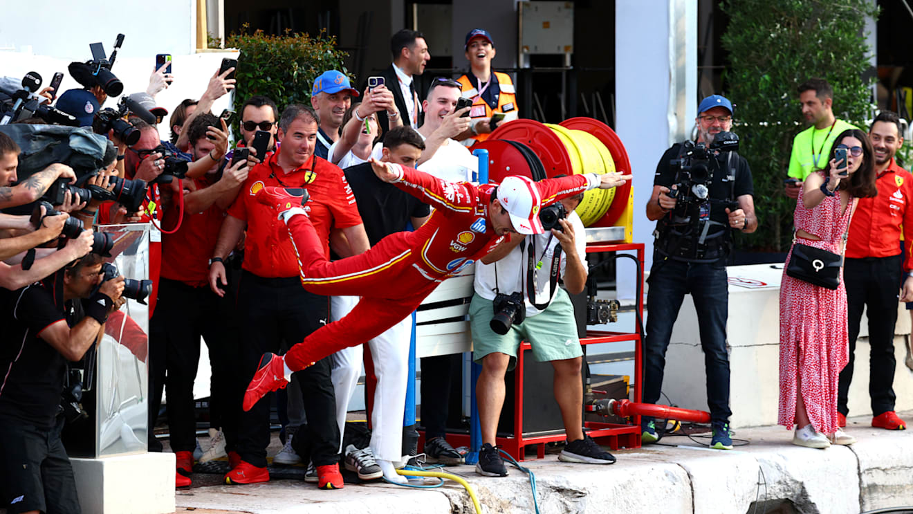 MONTE-CARLO, MONACO - MAY 26: Race winner Charles Leclerc of Monaco and Ferrari celebrates by jumping in the harbour after the F1 Grand Prix of Monaco at Circuit de Monaco on May 26, 2024 in Monte-Carlo, Monaco. (Photo by Clive Rose/Getty Images)