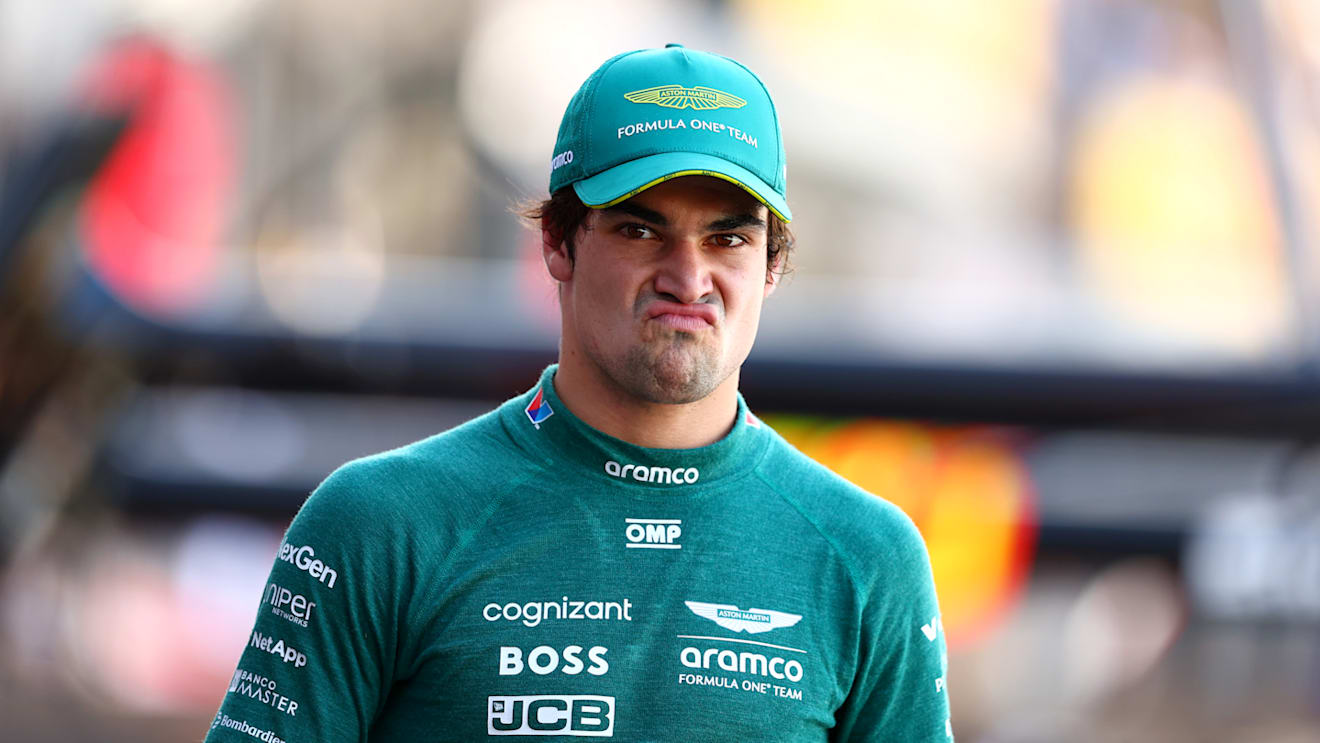 MONTE-CARLO, MONACO - MAY 25: 14th placed qualifier Lance Stroll of Canada and Aston Martin F1 Team walks in the Pitlane during qualifying ahead of the F1 Grand Prix of Monaco at Circuit de Monaco on May 25, 2024 in Monte-Carlo, Monaco. (Photo by Bryn Lennon - Formula 1/Formula 1 via Getty Images)