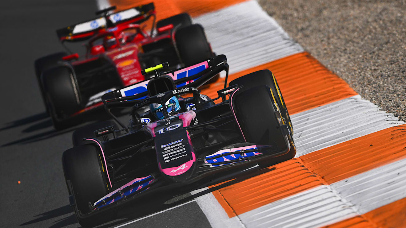 ZANDVOORT, NETHERLANDS - AUGUST 25: Pierre Gasly of France driving the (10) Alpine F1 A524 Renault leads Charles Leclerc of Monaco driving the (16) Ferrari SF-24 during the F1 Grand Prix of Netherlands at Circuit Zandvoort on August 25, 2024 in Zandvoort, Netherlands. (Photo by Rudy Carezzevoli/Getty Images)