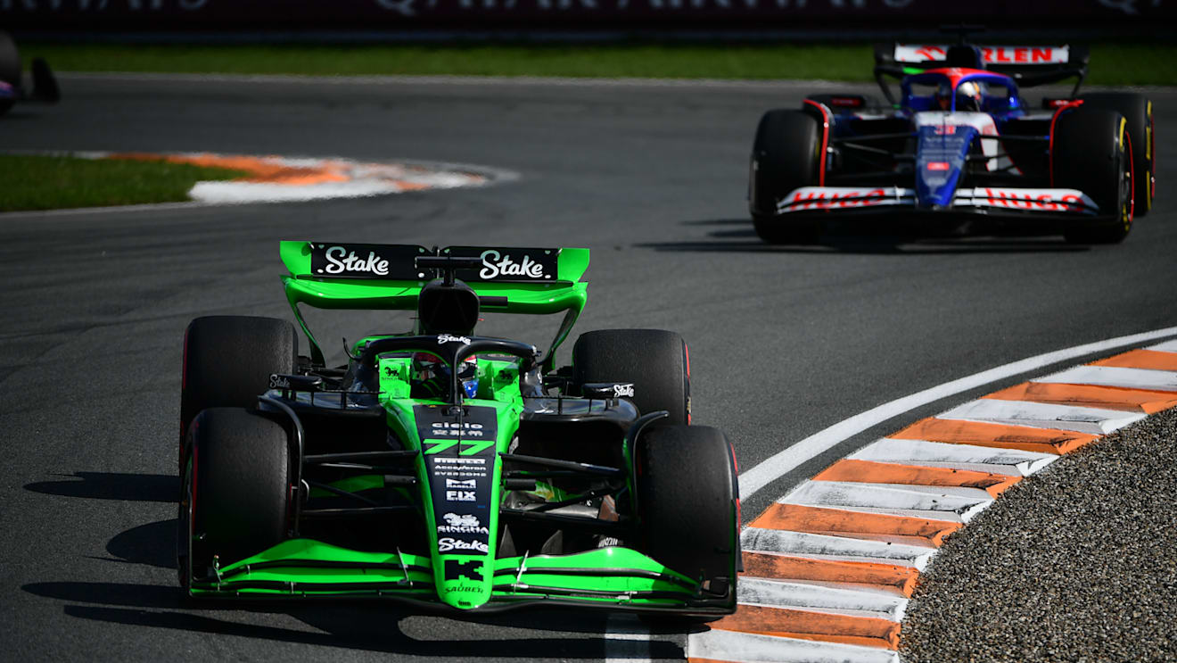 ZANDVOORT, NETHERLANDS - AUGUST 25: Valtteri Bottas of Finland driving the (77) Kick Sauber C44 Ferrari leads Daniel Ricciardo of Australia driving the (3) Visa Cash App RB VCARB 01 during the F1 Grand Prix of Netherlands at Circuit Zandvoort on August 25, 2024 in Zandvoort, Netherlands. (Photo by James Sutton - Formula 1/Formula 1 via Getty Images)