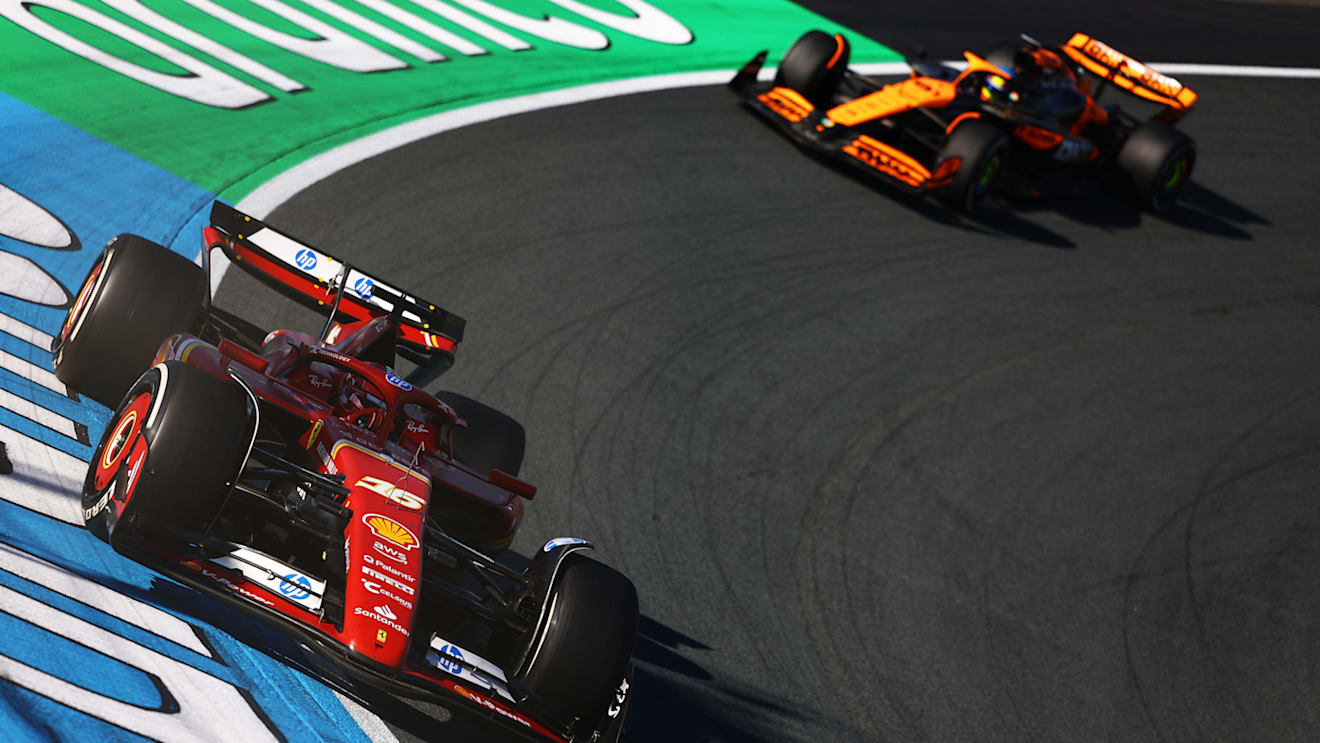 ZANDVOORT, NETHERLANDS - AUGUST 25: Charles Leclerc of Monaco driving the (16) Ferrari SF-24 leads Oscar Piastri of Australia driving the (81) McLaren MCL38 Mercedes during the F1 Grand Prix of Netherlands at Circuit Zandvoort on August 25, 2024 in Zandvoort, Netherlands. (Photo by Mark Thompson/Getty Images)