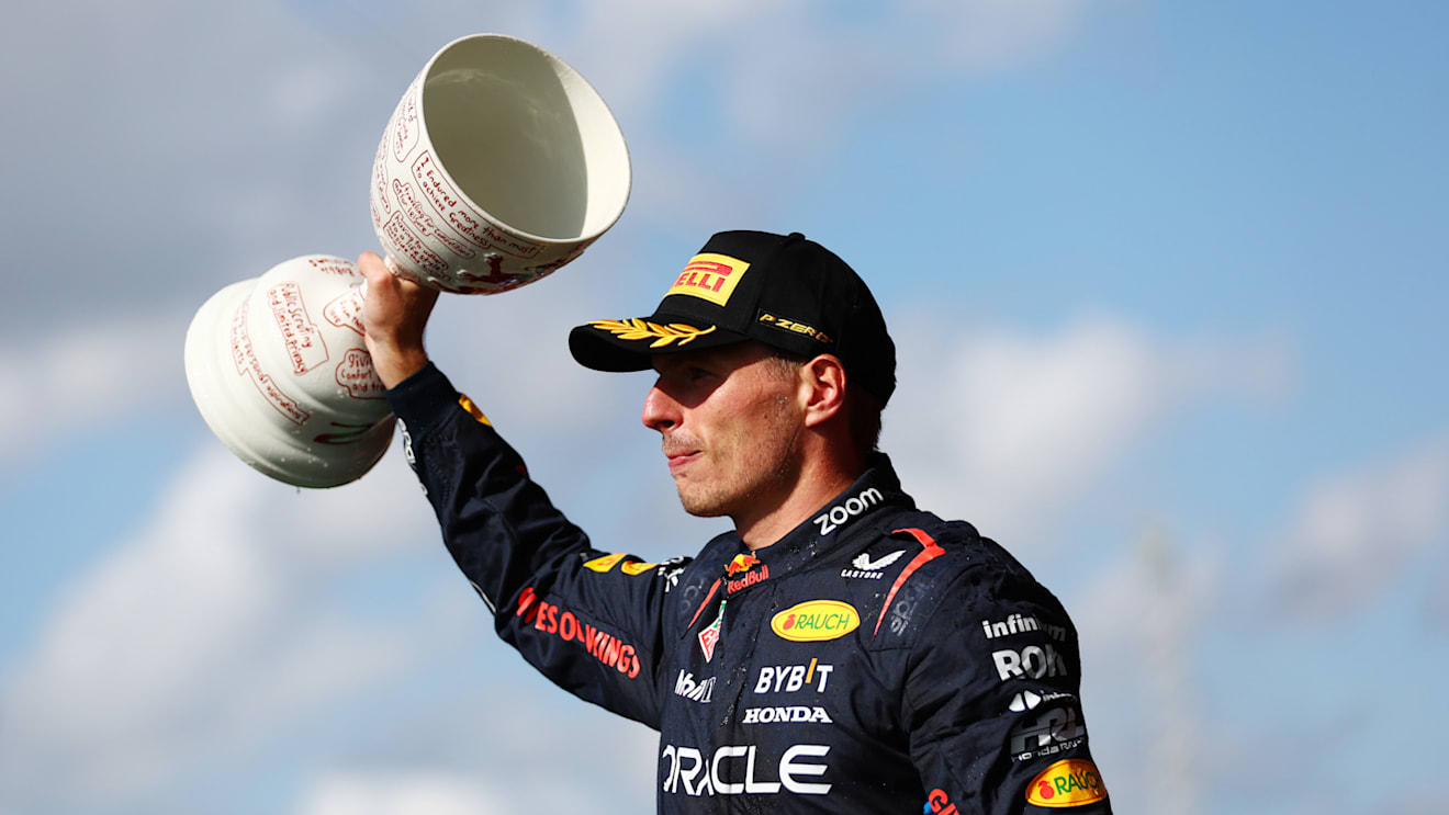 ZANDVOORT, NETHERLANDS - AUGUST 25: Second placed Max Verstappen of the Netherlands and Oracle Red Bull Racing celebrates in parc ferme after the F1 Grand Prix of Netherlands at Circuit Zandvoort on August 25, 2024 in Zandvoort, Netherlands. (Photo by Bryn Lennon - Formula 1/Formula 1 via Getty Images)