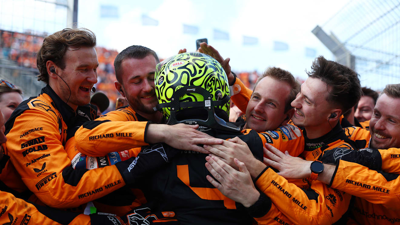 ZANDVOORT, NETHERLANDS - AUGUST 25: Race winner Lando Norris of Great Britain and McLaren celebrates with Team McLaren in parc ferme after the F1 Grand Prix of Netherlands at Circuit Zandvoort on August 25, 2024 in Zandvoort, Netherlands. (Photo by Bryn Lennon - Formula 1/Formula 1 via Getty Images)