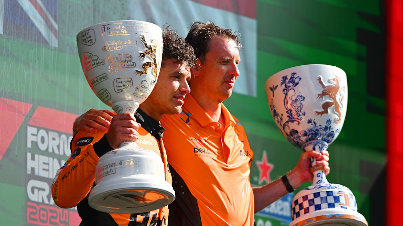 ZANDVOORT, NETHERLANDS - AUGUST 25: Race winner Lando Norris of Great Britain and McLaren and Will Joseph, Director, Race Engineering at McLaren celebrate in parc ferme after the F1 Grand Prix of Netherlands at Circuit Zandvoort on August 25, 2024 in Zandvoort, Netherlands. (Photo by Rudy Carezzevoli/Getty Images)