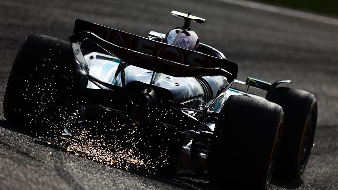 ZANDVOORT, NETHERLANDS - AUGUST 23: Sparks fly behind Lewis Hamilton of Great Britain driving the (44) Mercedes AMG Petronas F1 Team W15 on track during practice ahead of the F1 Grand Prix of Netherlands at Circuit Zandvoort on August 23, 2024 in Zandvoort, Netherlands. (Photo by Clive Rose/Getty Images)