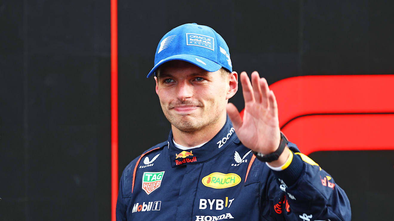 ZANDVOORT, NETHERLANDS - AUGUST 24: Second placed qualifier Max Verstappen of the Netherlands and Oracle Red Bull Racing acknowledges fans in parc ferme after qualifying ahead of the F1 Grand Prix of Netherlands at Circuit Zandvoort on August 24, 2024 in Zandvoort, Netherlands. (Photo by Mark Thompson/Getty Images)