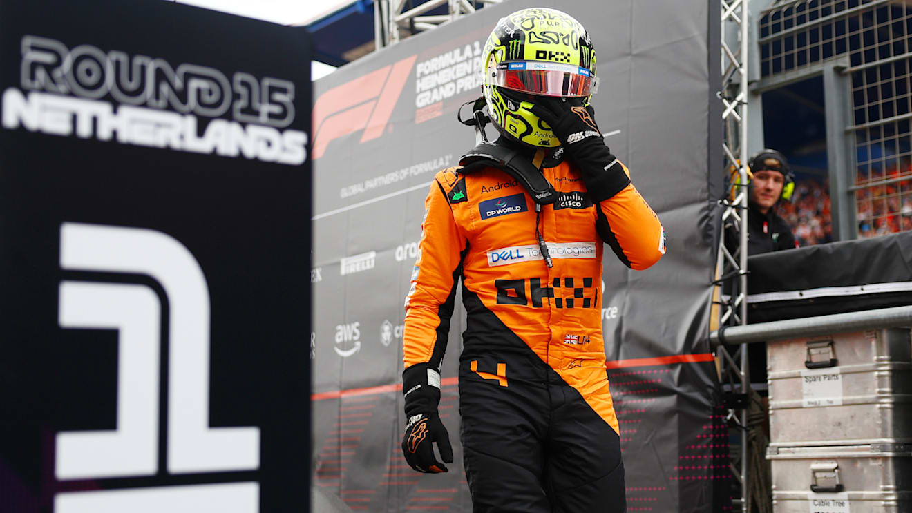 ZANDVOORT, NETHERLANDS - AUGUST 24: Pole position qualifier Lando Norris of Great Britain and McLaren looks on in parc ferme after qualifying ahead of the F1 Grand Prix of Netherlands at Circuit Zandvoort on August 24, 2024 in Zandvoort, Netherlands. (Photo by Bryn Lennon - Formula 1/Formula 1 via Getty Images)
