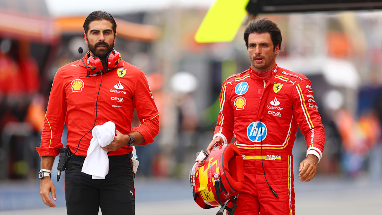 ZANDVOORT, NETHERLANDS - AUGUST 24: 11th placed qualifier Carlos Sainz of Spain and Ferrari walks in the Pitlane during qualifying ahead of the F1 Grand Prix of Netherlands at Circuit Zandvoort on August 24, 2024 in Zandvoort, Netherlands. (Photo by Bryn Lennon - Formula 1/Formula 1 via Getty Images)