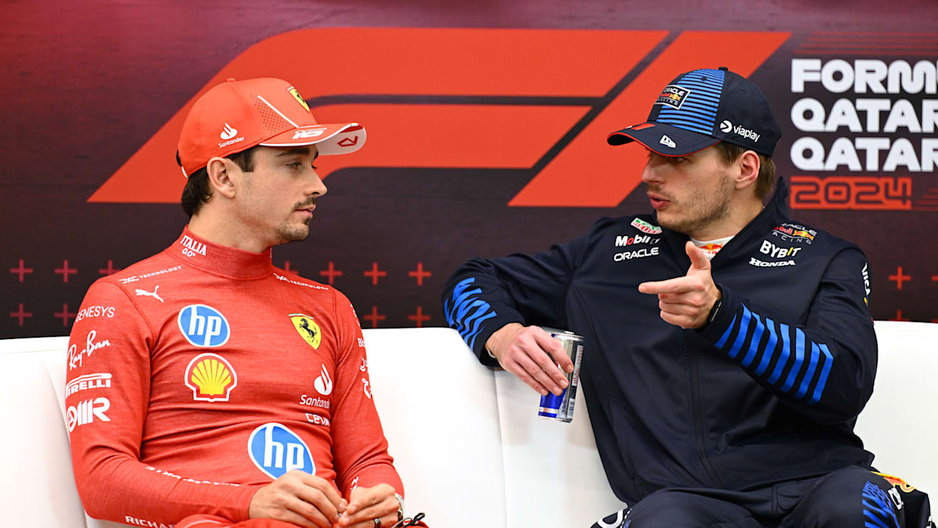 LUSAIL CITY, QATAR - DECEMBER 01: Race winner Max Verstappen of the Netherlands and Oracle Red Bull Racing and Charles Leclerc of Monaco and Ferrari attend the press conference after the F1 Grand Prix of Qatar at Lusail International Circuit on December 01, 2024 in Lusail City, Qatar. (Photo by Mark Sutton/Getty Images)