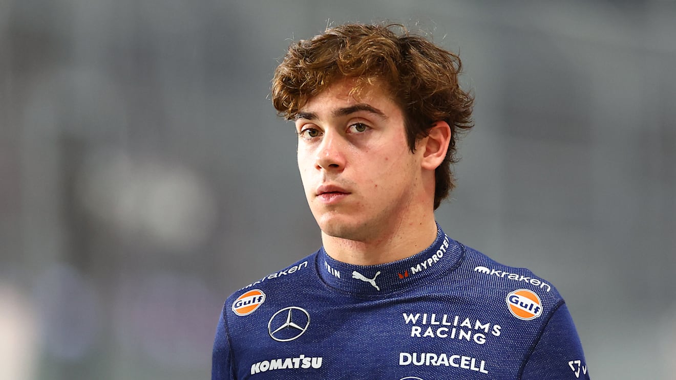 LUSAIL CITY, QATAR - NOVEMBER 29: 20th placed qualifier Franco Colapinto of Argentina and Williams walks in the Pitlane during Sprint Qualifying ahead of the F1 Grand Prix of Qatar at Lusail International Circuit on November 29, 2024 in Lusail City, Qatar. (Photo by Bryn Lennon - Formula 1/Formula 1 via Getty Images)
