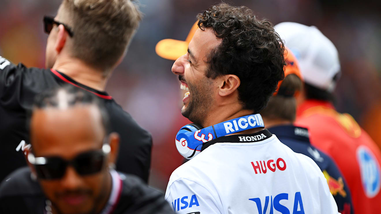 BARCELONA, SPAIN - JUNE 23: Daniel Ricciardo of Australia and Visa Cash App RB looks on from the drivers parade prior to the F1 Grand Prix of Spain at Circuit de Barcelona-Catalunya on June 23, 2024 in Barcelona, Spain. (Photo by Rudy Carezzevoli/Getty Images)