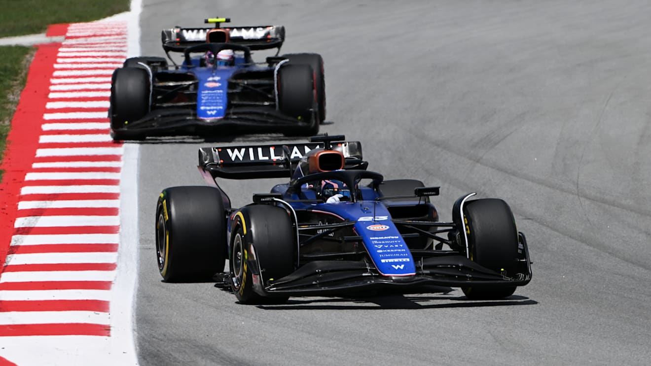 BARCELONA, SPAIN - JUNE 23: Alexander Albon of Thailand driving the (23) Williams FW46 Mercedes leads Logan Sargeant of United States driving the (2) Williams FW46 Mercedes on track during the F1 Grand Prix of Spain at Circuit de Barcelona-Catalunya on June 23, 2024 in Barcelona, Spain. (Photo by Mark Sutton - Formula 1/Formula 1 via Getty Images)