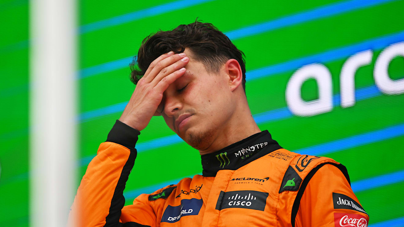 BARCELONA, SPAIN - JUNE 23: Second placed Lando Norris of Great Britain and McLaren reacts on the podium during the F1 Grand Prix of Spain at Circuit de Barcelona-Catalunya on June 23, 2024 in Barcelona, Spain. (Photo by Rudy Carezzevoli/Getty Images)