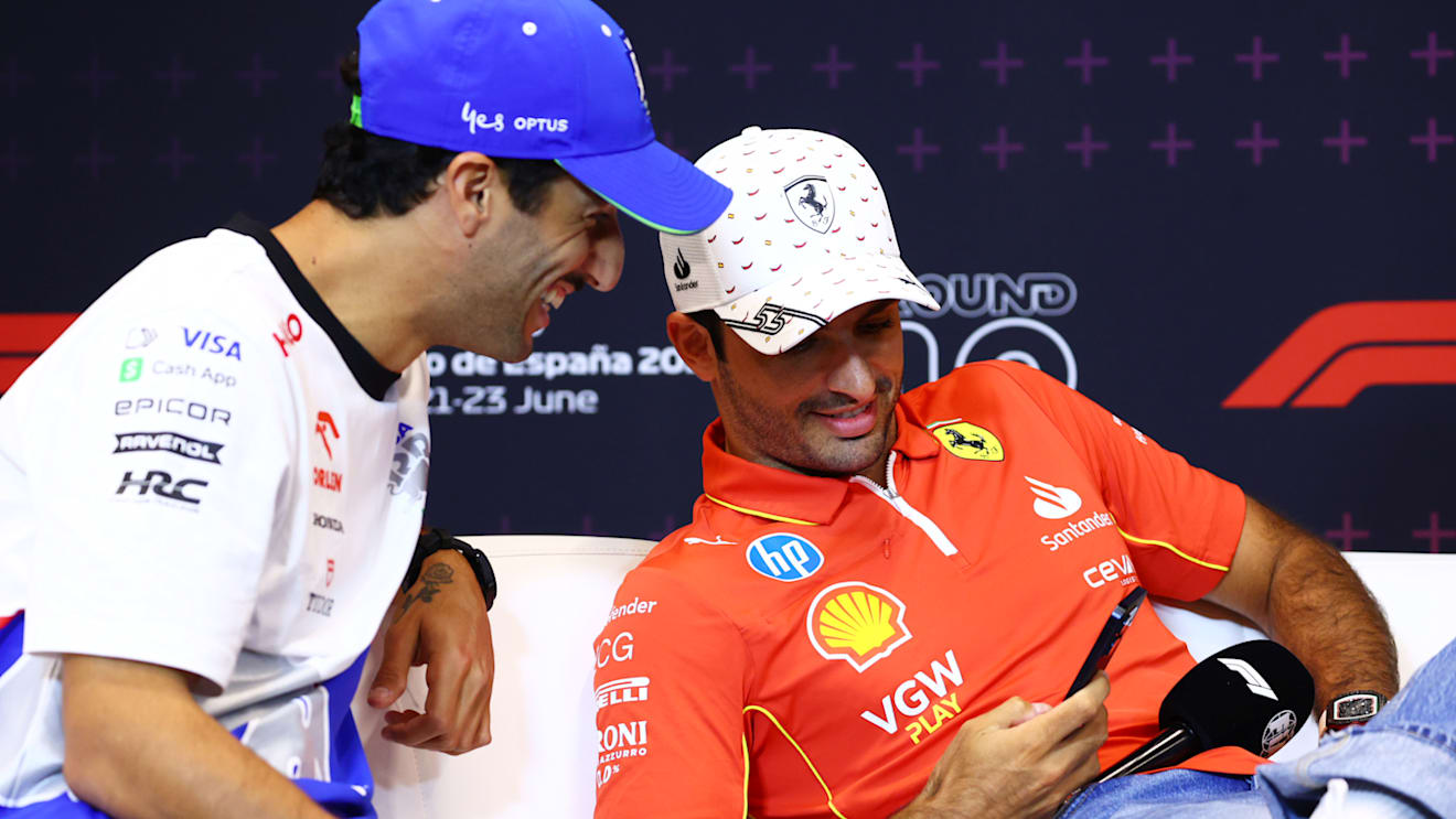BARCELONA, SPAIN - JUNE 20: Carlos Sainz of Spain and Ferrari and Daniel Ricciardo of Australia and Visa Cash App RB attend the press conference during previews ahead of the F1 Grand Prix of Spain at Circuit de Barcelona-Catalunya on June 20, 2024 in Barcelona, Spain. (Photo by Clive Rose/Getty Images)