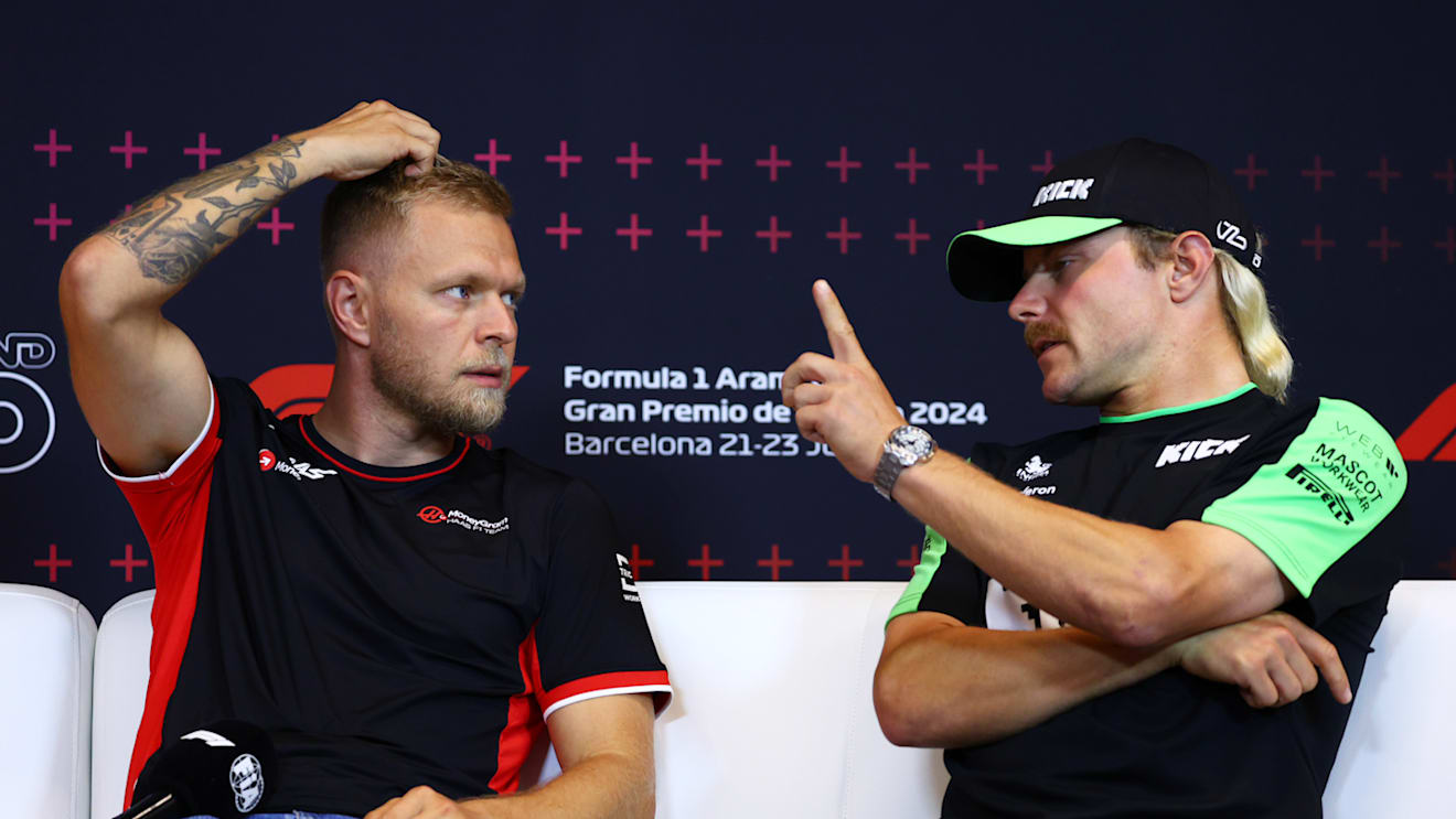 BARCELONA, SPAIN - JUNE 20: Kevin Magnussen of Denmark and Haas F1 and Valtteri Bottas of Finland and Stake F1 Team Kick Sauber attend the press conference during previews ahead of the F1 Grand Prix of Spain at Circuit de Barcelona-Catalunya on June 20, 2024 in Barcelona, Spain. (Photo by Clive Rose/Getty Images)