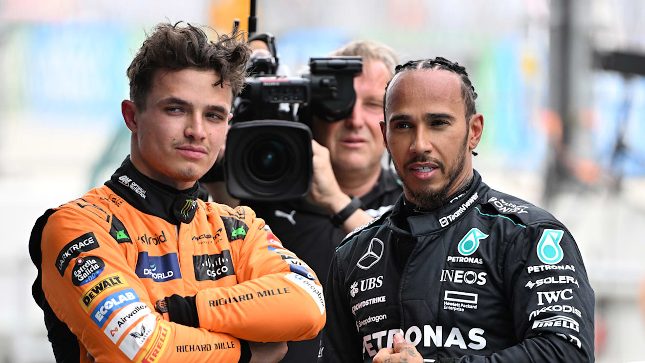 BARCELONA, SPAIN - JUNE 22: Pole position qualifier Lando Norris of Great Britain and McLaren and Third placed qualifier Lewis Hamilton of Great Britain and Mercedes talk in parc ferme during qualifying ahead of the F1 Grand Prix of Spain at Circuit de Barcelona-Catalunya on June 22, 2024 in Barcelona, Spain. (Photo by Mark Sutton - Formula 1/Formula 1 via Getty Images)