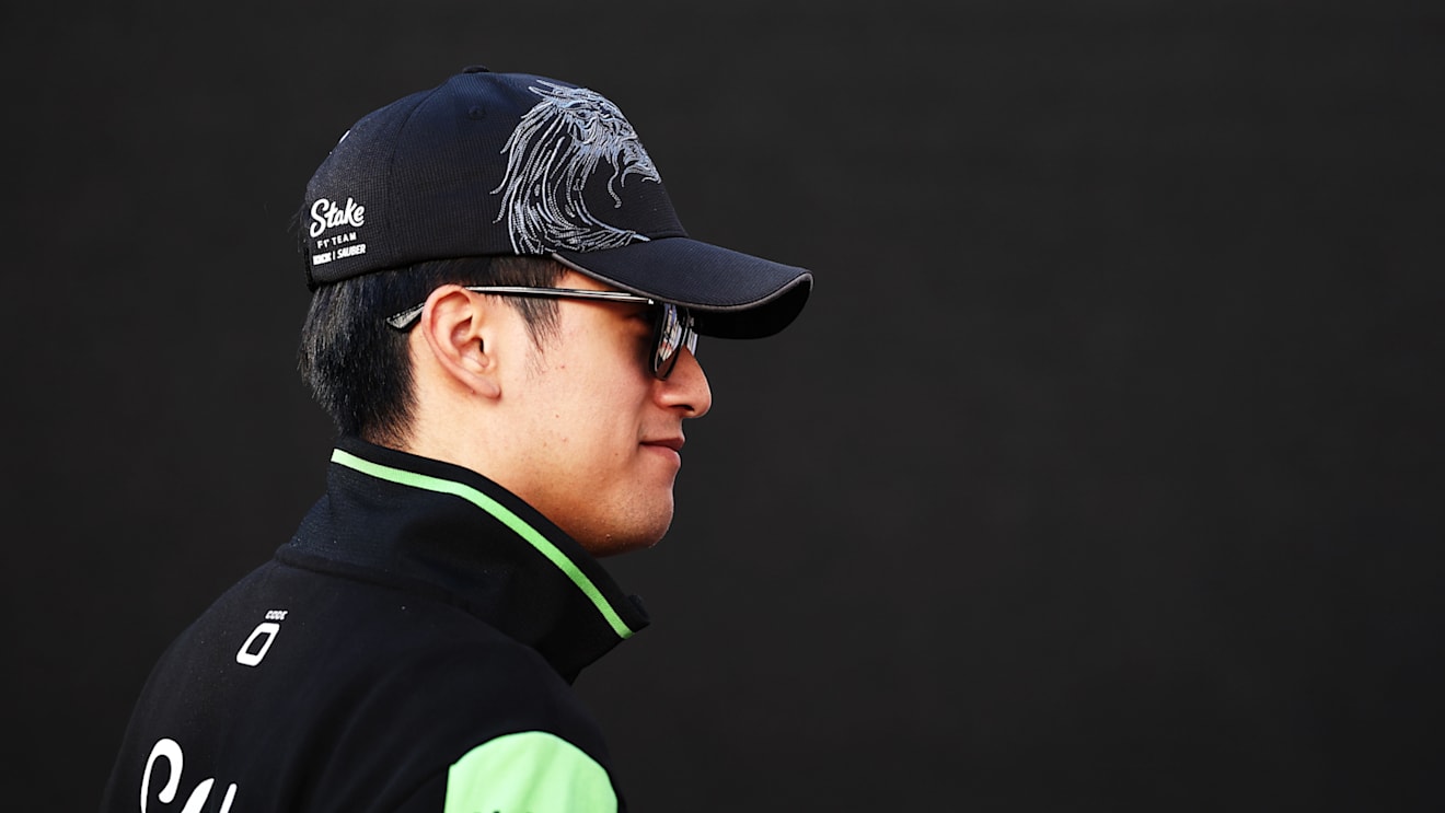 AUSTIN, TEXAS - OCTOBER 20: Zhou Guanyu of China and Stake F1 Team Kick Sauber walks in the Paddock prior to the F1 Grand Prix of United States at Circuit of The Americas on October 20, 2024 in Austin, Texas. (Photo by Jared C. Tilton/Getty Images)