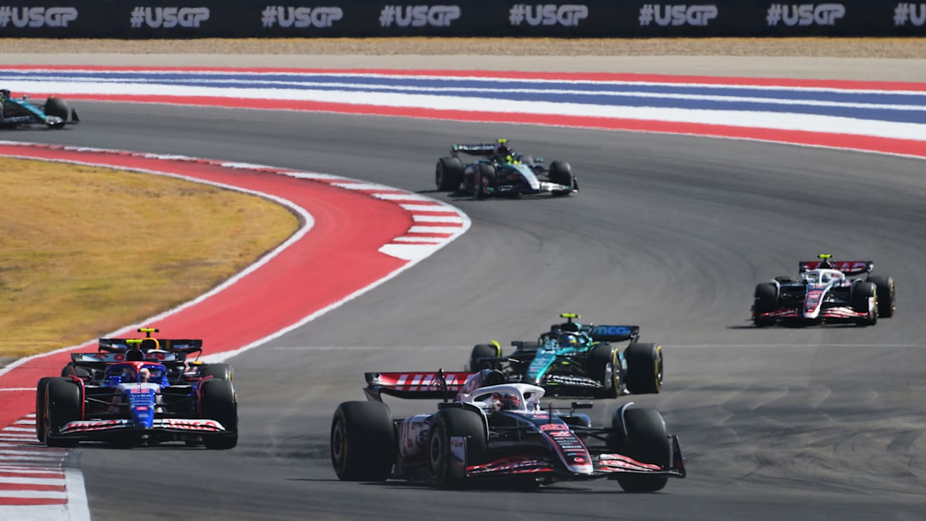 AUSTIN, TEXAS - OCTOBER 20: Kevin Magnussen of Denmark driving the (20) Haas F1 VF-24 Ferrari leads Yuki Tsunoda of Japan driving the (22) Visa Cash App RB VCARB 01 on track during the F1 Grand Prix of United States at Circuit of The Americas on October 20, 2024 in Austin, Texas. (Photo by Mark Sutton/Getty Images)