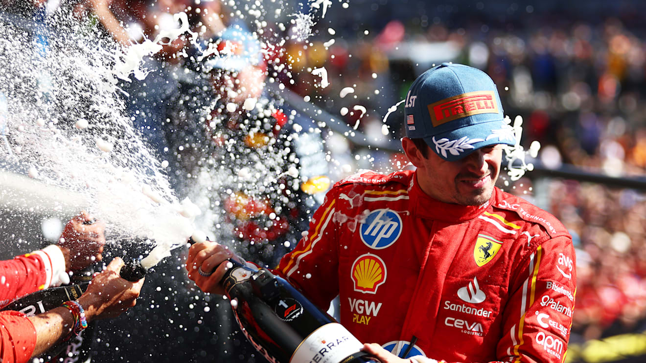 AUSTIN, TEXAS - OCTOBER 20: Race winner Charles Leclerc of Monaco and Ferrari celebrates on the podium during the F1 Grand Prix of United States at Circuit of The Americas on October 20, 2024 in Austin, Texas. (Photo by Bryn Lennon - Formula 1/Formula 1 via Getty Images)
