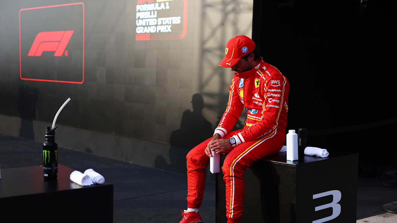 AUSTIN, TEXAS - OCTOBER 19: Third placed qualifier Carlos Sainz of Spain and Ferrari looks on in parc ferme during qualifying ahead of the F1 Grand Prix of United States at Circuit of The Americas on October 19, 2024 in Austin, Texas. (Photo by Bryn Lennon - Formula 1/Formula 1 via Getty Images)