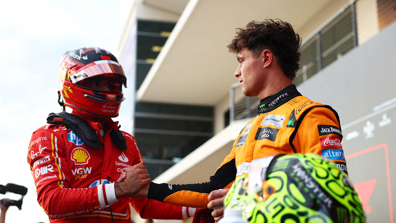 AUSTIN, TEXAS - OCTOBER 19: Pole position qualifier Lando Norris of Great Britain and McLaren is congratulated by Third placed qualifier Carlos Sainz of Spain and Ferrari in parc ferme during qualifying ahead of the F1 Grand Prix of United States at Circuit of The Americas on October 19, 2024 in Austin, Texas. (Photo by Bryn Lennon - Formula 1/Formula 1 via Getty Images)