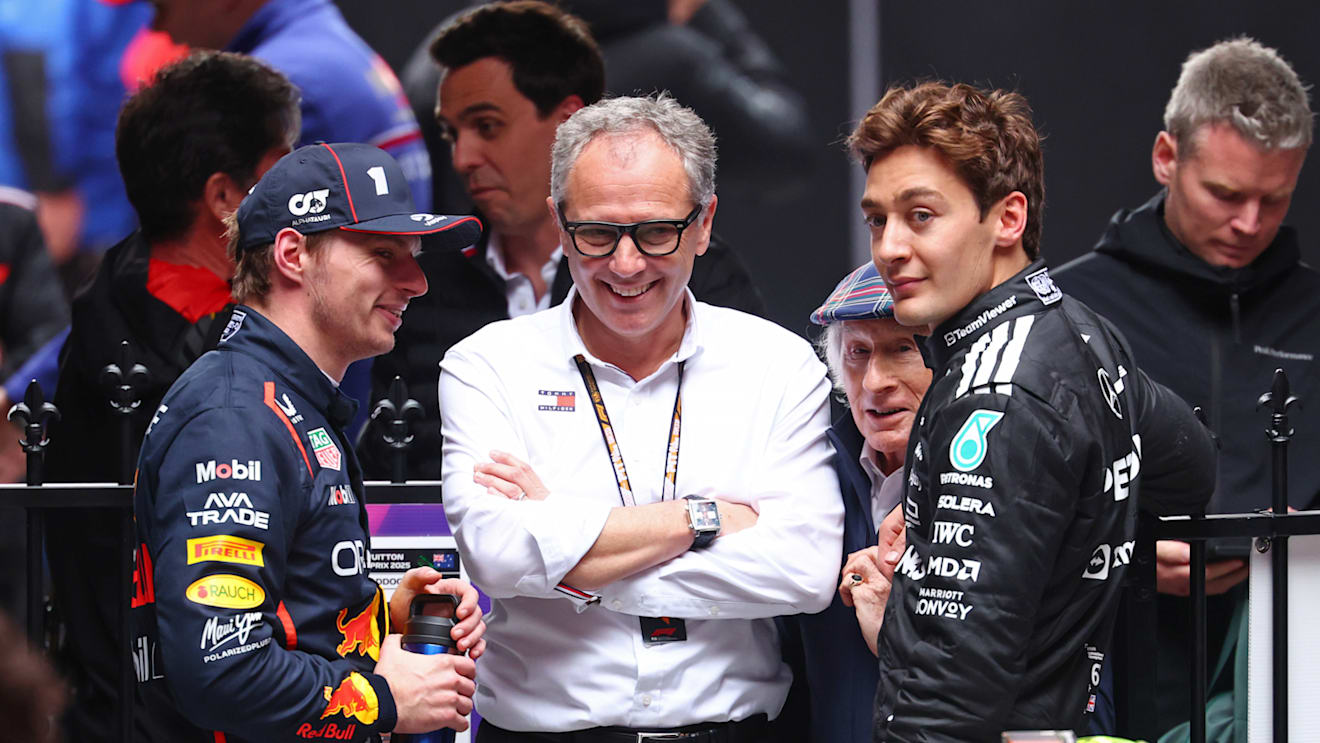 MELBOURNE, AUSTRALIA - MARCH 16: Second placed Max Verstappen of the Netherlands and Oracle Red Bull Racing and Third placed George Russell of Great Britain and Mercedes AMG Petronas F1 Team with Stefano Domenicali, CEO of the Formula One Group in parc ferme during the F1 Grand Prix of Australia at Albert Park Grand Prix Circuit on March 16, 2025 in Melbourne, Australia. (Photo by Clive Rose/Getty Images)