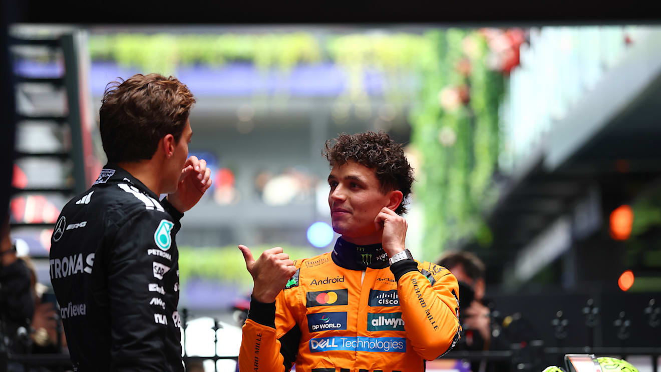 MELBOURNE, AUSTRALIA - MARCH 16: Third placed George Russell of Great Britain and Mercedes AMG Petronas F1 Team and Race winner Lando Norris of Great Britain and McLaren talk in parc ferme during the F1 Grand Prix of Australia at Albert Park Grand Prix Circuit on March 16, 2025 in Melbourne, Australia. (Photo by Bryn Lennon - Formula 1/Formula 1 via Getty Images)