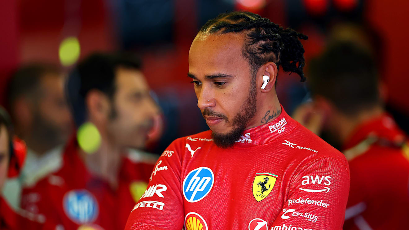 MELBOURNE, AUSTRALIA - MARCH 14: Lewis Hamilton of Great Britain and Scuderia Ferrari prepares to drive in the garage prior to practice ahead of the F1 Grand Prix of Australia at Albert Park Grand Prix Circuit on March 14, 2025 in Melbourne, Australia. (Photo by Bryn Lennon - Formula 1/Formula 1 via Getty Images)