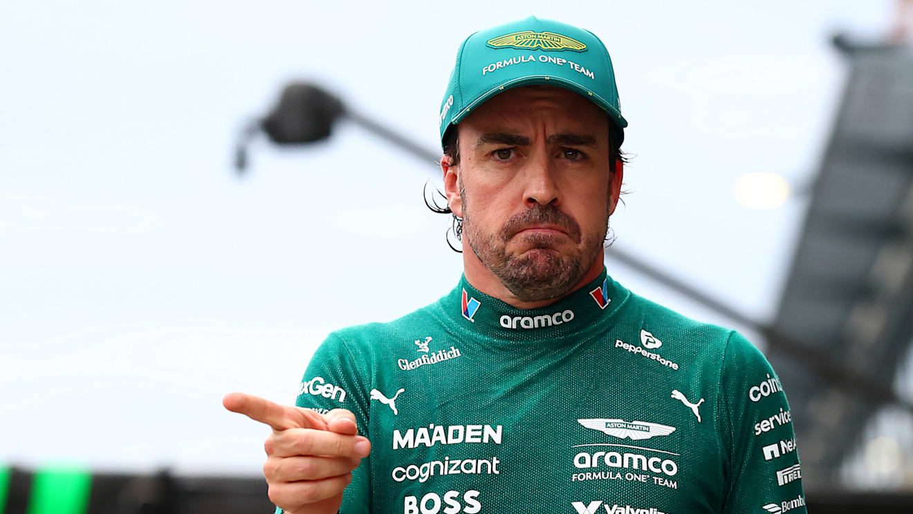 MELBOURNE, AUSTRALIA - MARCH 15: Twelth placed qualifier Fernando Alonso of Spain and Aston Martin F1 Team looks on in the Pitlane during qualifying ahead of the F1 Grand Prix of Australia at Albert Park Grand Prix Circuit on March 15, 2025 in Melbourne, Australia. (Photo by Bryn Lennon - Formula 1/Formula 1 via Getty Images)