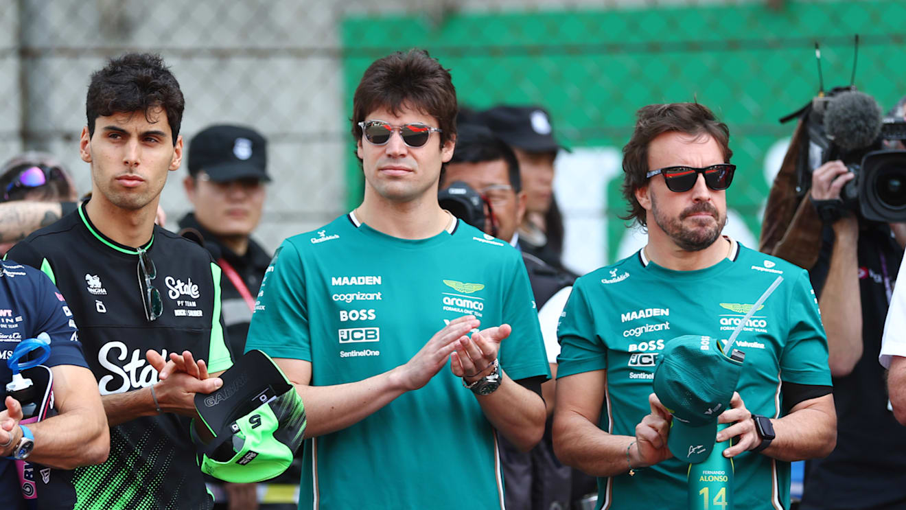 SHANGHAI, CHINA - MARCH 23: Gabriel Bortoleto of Brazil and Stake F1 Team Kick Sauber Lance Stroll of Canada and Aston Martin F1 Team and Fernando Alonso of Spain and Aston Martin F1 Team at the tribute to the late Eddie Jordan prior to the F1 Grand Prix of China at Shanghai International Circuit on March 23, 2025 in Shanghai, China. (Photo by Bryn Lennon - Formula 1/Formula 1 via Getty Images)