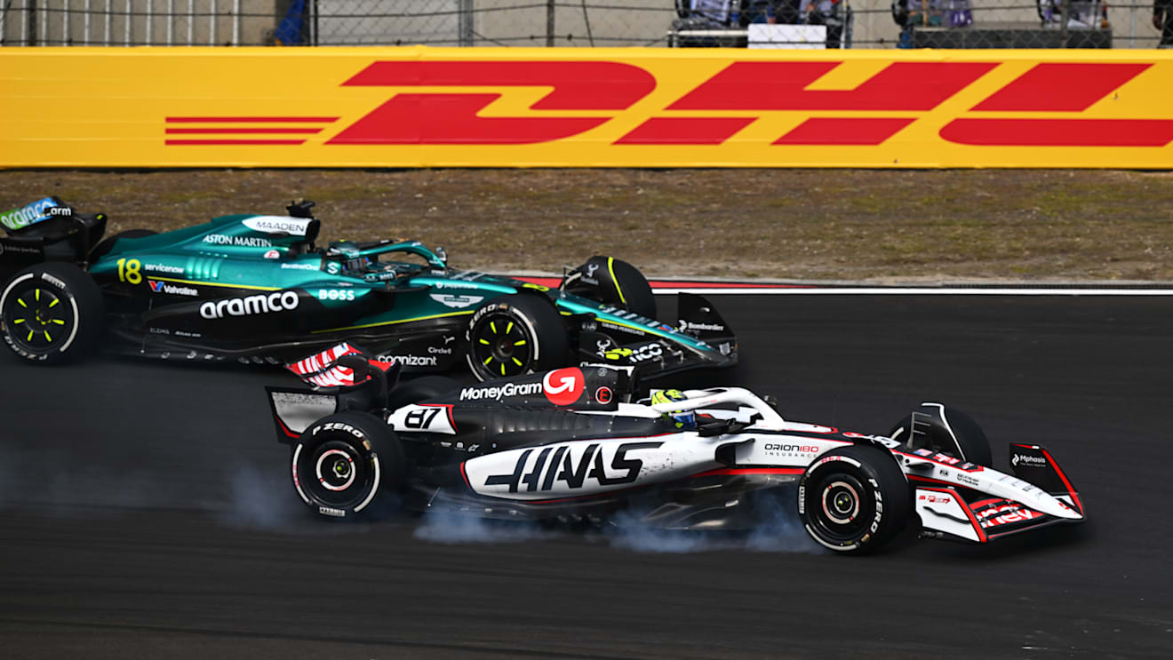 SHANGHAI, CHINA - MARCH 23: Oliver Bearman of Great Britain driving the (87) Haas F1 VF-25 Ferrari leads Lance Stroll of Canada driving the (18) Aston Martin F1 Team AMR25 Mercedes on track during the F1 Grand Prix of China at Shanghai International Circuit on March 23, 2025 in Shanghai, China. (Photo by Clive Mason/Getty Images)