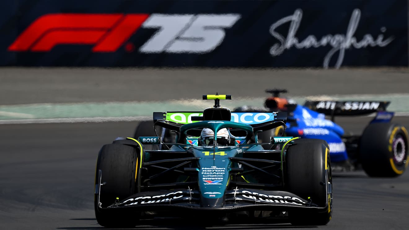 SHANGHAI, CHINA - MARCH 22: Fernando Alonso of Spain driving the (14) Aston Martin F1 Team AMR25 Mercedes leads Alexander Albon of Thailand driving the (23) Williams FW47 Mercedes on track during the Sprint ahead of the F1 Grand Prix of China at Shanghai International Circuit on March 22, 2025 in Shanghai, China. (Photo by Clive Mason/Getty Images)