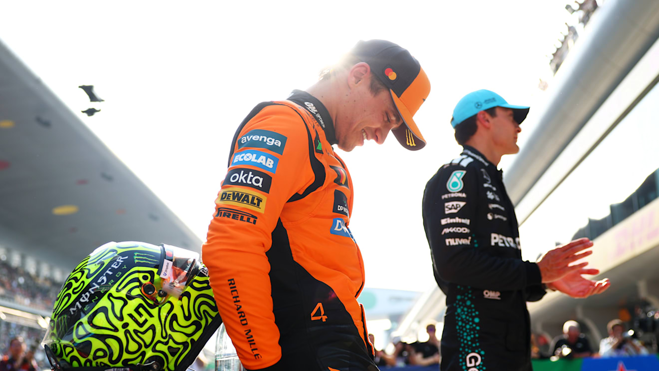SHANGHAI, CHINA - MARCH 22: Third placed qualifier Lando Norris of Great Britain and McLaren and Second placed qualifier George Russell of Great Britain and Mercedes AMG Petronas F1 Team in parc ferme during qualifying ahead of the F1 Grand Prix of China at Shanghai International Circuit on March 22, 2025 in Shanghai, China. (Photo by Bryn Lennon - Formula 1/Formula 1 via Getty Images)