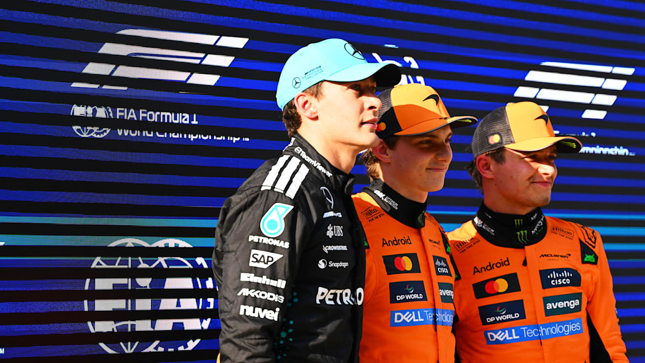 SHANGHAI, CHINA - MARCH 22: Second placed qualifier George Russell of Great Britain and Mercedes AMG Petronas F1 Team Pole position qualifier Oscar Piastri of Australia and McLaren and Third placed qualifier Lando Norris of Great Britain and McLaren looks on during qualifying ahead of the F1 Grand Prix of China at Shanghai International Circuit on March 22, 2025 in Shanghai, China. (Photo by Mark Sutton - Formula 1/Formula 1 via Getty Images)