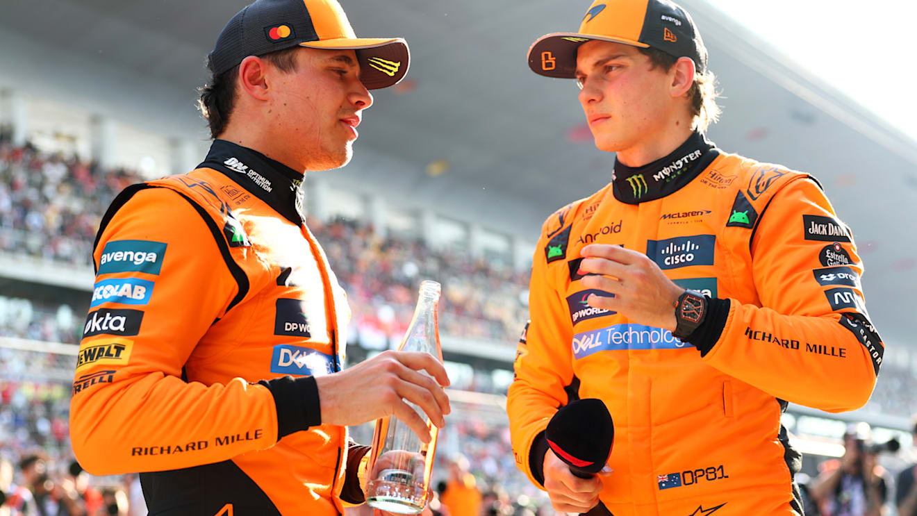 SHANGHAI, CHINA - MARCH 22: Pole position qualifier Oscar Piastri of Australia and McLaren and Third placed qualifier Lando Norris of Great Britain and McLaren talk in parc ferme during qualifying ahead of the F1 Grand Prix of China at Shanghai International Circuit on March 22, 2025 in Shanghai, China. (Photo by Bryn Lennon - Formula 1/Formula 1 via Getty Images)