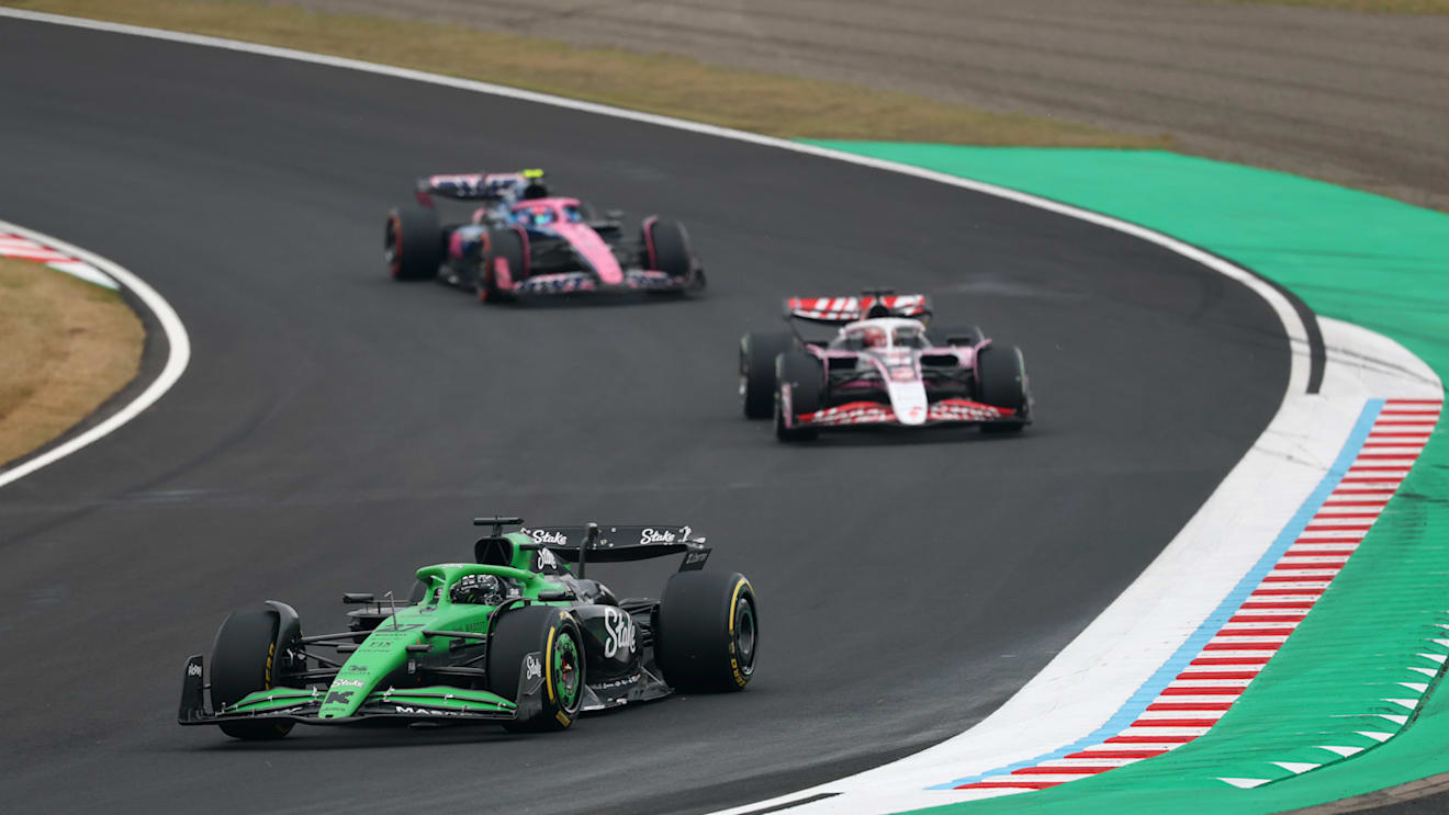 SUZUKA, JAPAN - APRIL 06: Nico Hulkenberg of Germany driving the (27) Kick Sauber C45 Ferrari leads Esteban Ocon of France driving the (31) Haas F1 VF-25 Ferrari and Jack Doohan of Australia driving the (7) Alpine F1 A525 Renault on track during the F1 Grand Prix of Japan at Suzuka Circuit on April 06, 2025 in Suzuka, Japan. (Photo by Clive Rose/Getty Images)