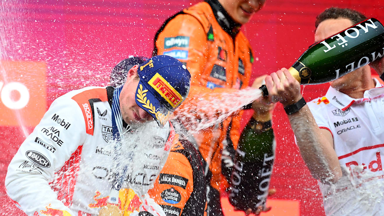 SUZUKA, JAPAN - APRIL 06: Race winner Max Verstappen of the Netherlands and Oracle Red Bull Racing and Hugh Bird, Race Engineer of Oracle Red Bull Racing celebrate on the podium with Champagne during the F1 Grand Prix of Japan at Suzuka Circuit on April 06, 2025 in Suzuka, Japan. (Photo by Clive Mason/Getty Images)