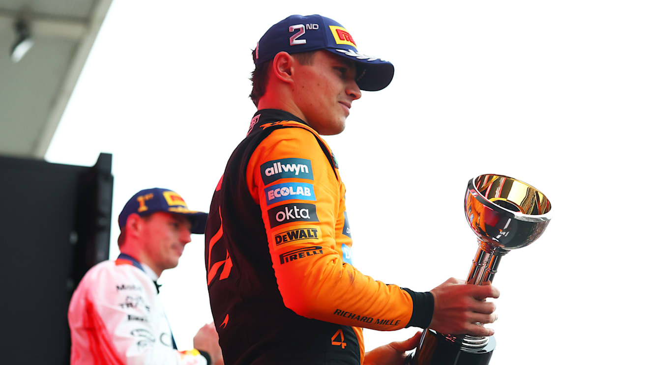 SUZUKA, JAPAN - APRIL 06: Second placed Lando Norris of Great Britain and McLaren on the podium with his trophy during the F1 Grand Prix of Japan at Suzuka Circuit on April 06, 2025 in Suzuka, Japan. (Photo by Bryn Lennon - Formula 1/Formula 1 via Getty Images)