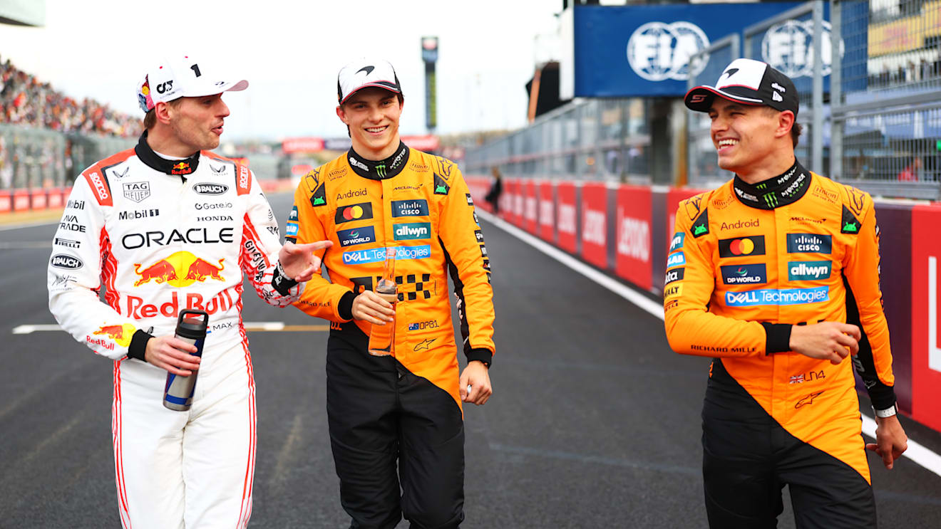 SUZUKA, JAPAN - APRIL 05: Pole position qualifier Max Verstappen of the Netherlands and Oracle Red Bull Racing Third placed qualifier Oscar Piastri of Australia and McLaren and Second placed qualifier Lando Norris of Great Britain and McLaren talk in parc ferme during qualifying ahead of the F1 Grand Prix of Japan at Suzuka Circuit on April 05, 2025 in Suzuka, Japan. (Photo by Bryn Lennon - Formula 1/Formula 1 via Getty Images)