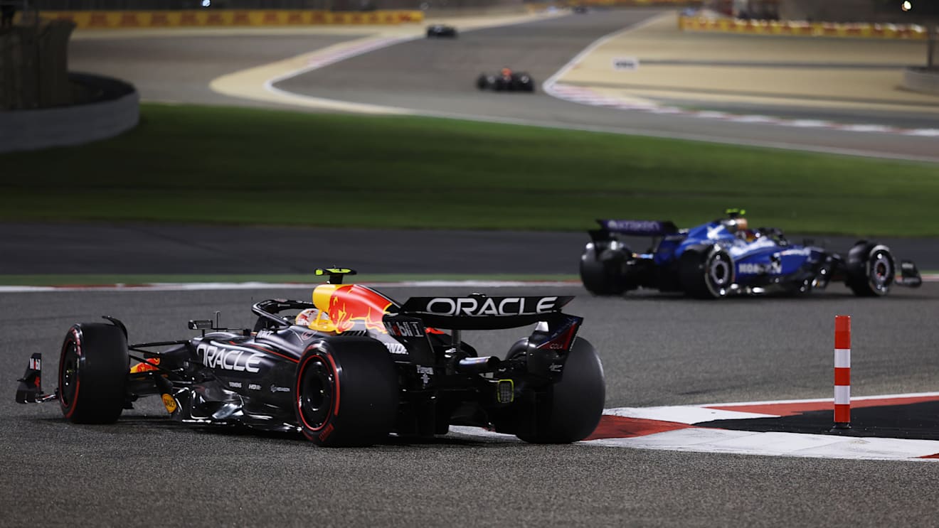 BAHRAIN, BAHRAIN - APRIL 13: Carlos Sainz of Spain driving the (55) Williams FW47 Mercedes leads Yuki Tsunoda of Japan driving the (22) Oracle Red Bull Racing RB21 on track during the F1 Grand Prix of Bahrain at Bahrain International Circuit on April 13, 2025 in Bahrain, Bahrain. (Photo by Mark Thompson/Getty Images)