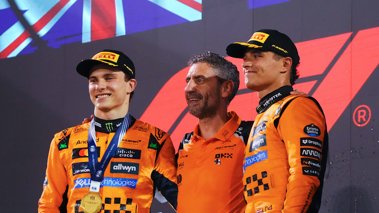 BAHRAIN, BAHRAIN - APRIL 13: Race winner Oscar Piastri of Australia and McLaren Andrea Stella, Team Principal of McLaren and Third placed Lando Norris of Great Britain and McLaren on the podium during the F1 Grand Prix of Bahrain at Bahrain International Circuit on April 13, 2025 in Bahrain, Bahrain. (Photo by Malcolm Griffiths - Formula 1/Formula 1 via Getty Images)