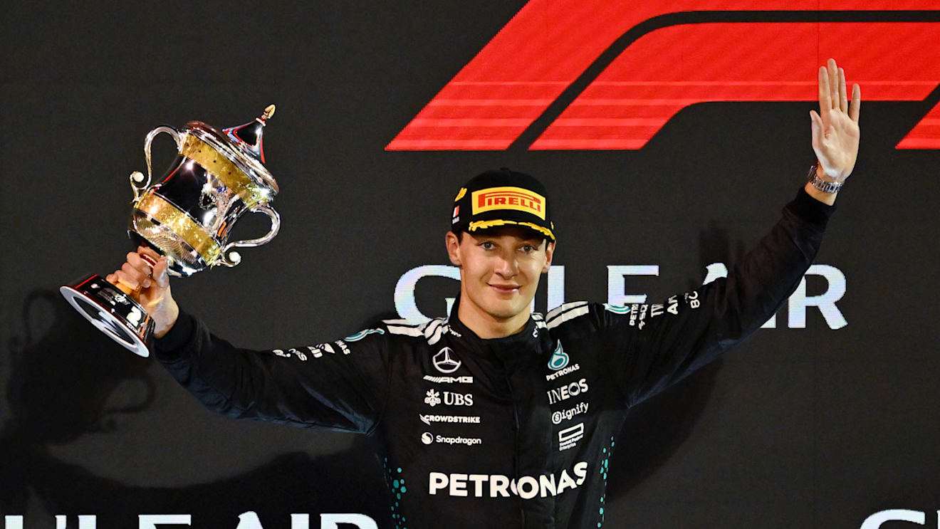 BAHRAIN, BAHRAIN - APRIL 13: Second placed George Russell of Great Britain and Mercedes AMG Petronas F1 Team on the podium with his trophy during the F1 Grand Prix of Bahrain at Bahrain International Circuit on April 13, 2025 in Bahrain, Bahrain. (Photo by Mark Sutton - Formula 1/Formula 1 via Getty Images)