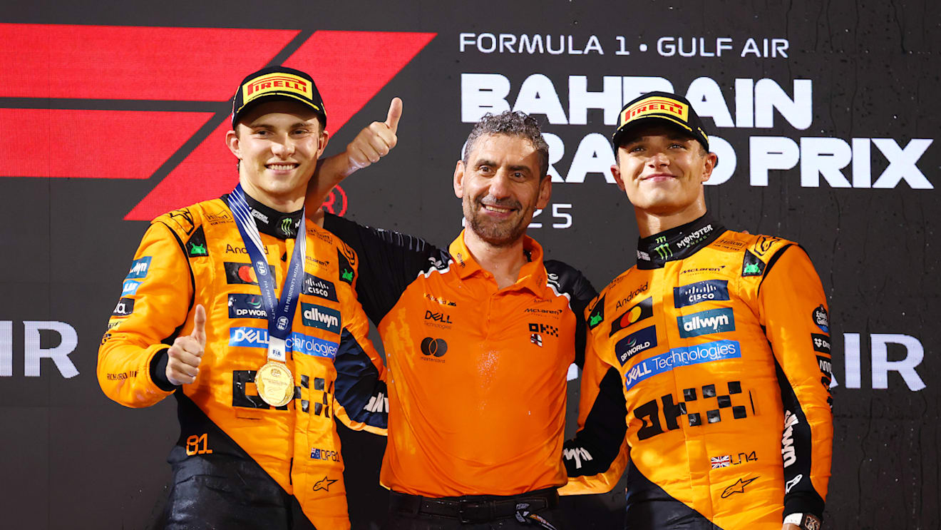 BAHRAIN, BAHRAIN - APRIL 13: Race winner Oscar Piastri of Australia and McLaren Andrea Stella, Team Principal of McLaren and Third placed Lando Norris of Great Britain and McLaren on the podium during the F1 Grand Prix of Bahrain at Bahrain International Circuit on April 13, 2025 in Bahrain, Bahrain. (Photo by Clive Rose/Getty Images)