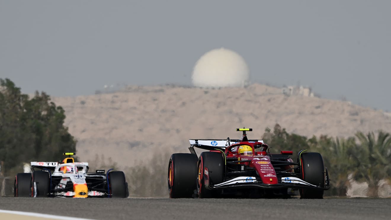 BAHRAIN, BAHRAIN - APRIL 11: Lewis Hamilton of Great Britain driving the (44) Scuderia Ferrari SF-25 leads Liam Lawson of New Zealand driving the (30) Visa Cash App Racing Bulls VCARB 02 on track during practice ahead of the F1 Grand Prix of Bahrain at Bahrain International Circuit on April 11, 2025 in Bahrain, Bahrain. (Photo by Mark Sutton - Formula 1/Formula 1 via Getty Images)