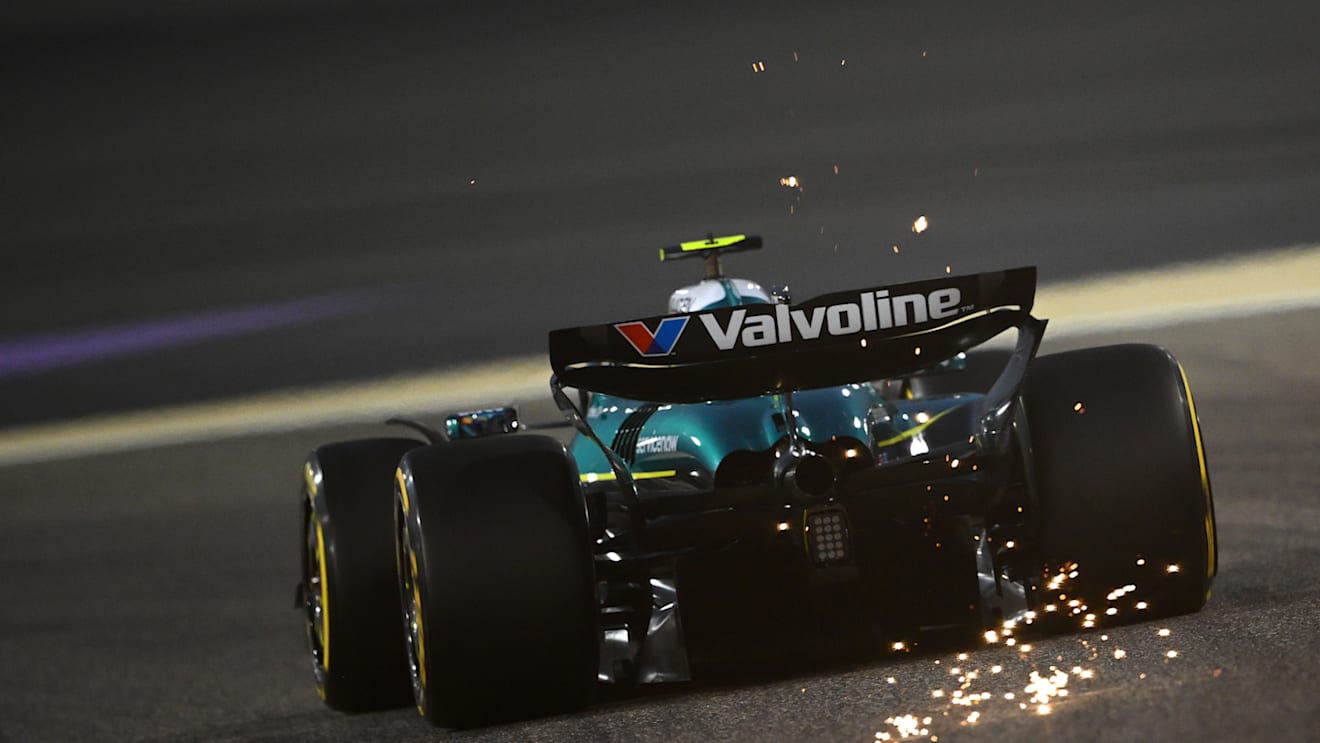 BAHRAIN, BAHRAIN - APRIL 11: Sparks fly behind Fernando Alonso of Spain driving the (14) Aston Martin F1 Team AMR25 Mercedes on track during practice ahead of the F1 Grand Prix of Bahrain at Bahrain International Circuit on April 11, 2025 in Bahrain, Bahrain. (Photo by Clive Mason/Getty Images)