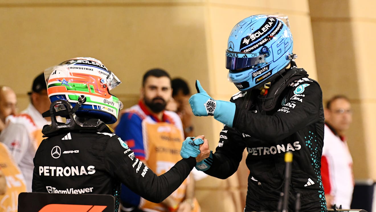 BAHRAIN, BAHRAIN - APRIL 12: Second placed qualifier George Russell of Great Britain and Mercedes AMG Petronas F1 Team is congratulated by Fourth placed qualifier Andrea Kimi Antonelli of Italy and Mercedes AMG Petronas F1 Team in parc ferme during qualifying ahead of the F1 Grand Prix of Bahrain at Bahrain International Circuit on April 12, 2025 in Bahrain, Bahrain. (Photo by Mark Sutton - Formula 1/Formula 1 via Getty Images)