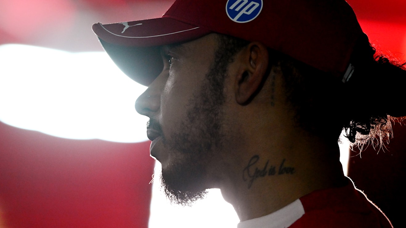 BAHRAIN, BAHRAIN - APRIL 12: Ninth placed qualifier Lewis Hamilton of Great Britain and Scuderia Ferrari looks on during qualifying ahead of the F1 Grand Prix of Bahrain at Bahrain International Circuit on April 12, 2025 in Bahrain, Bahrain. (Photo by Rudy Carezzevoli/Getty Images)