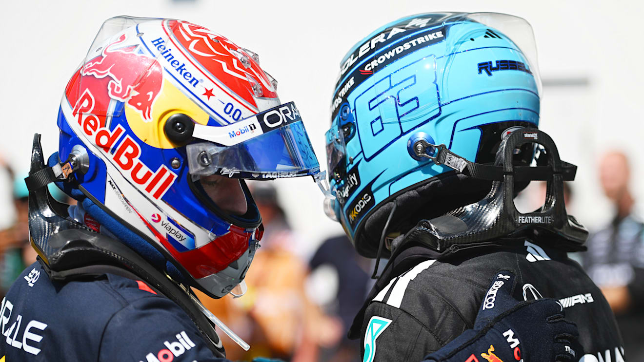 MONTREAL, QUEBEC - JUNE 15: Race winner George Russell of Great Britain and Mercedes AMG Petronas F1 Team and Second placed Max Verstappen of the Netherlands and Oracle Red Bull Racing congratulate each other in parc ferme during the F1 Grand Prix of Canada at Circuit Gilles-Villeneuve on June 15, 2025 in Montreal, Quebec. (Photo by Rudy Carezzevoli/Getty Images)